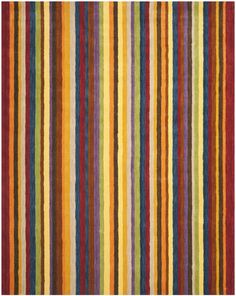 a multicolored rug with vertical stripes