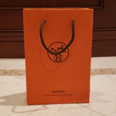 Brand New Authentic Hermes Gift Paper Shopping Bag Italy 6x8.5" Size: 6x8.5" Authentic Made In Italy Absolutely Brand New, In Perfect Condition. Kept In A Clean & Smoke And Pet Free Environment Good Luck! Hermes Gift, Hermes Orange, Gift Paper, Paper Gifts, Small Bags, Paper Shopping Bag, Good Luck, Guest Room, Storage Organization