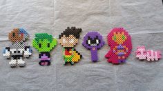 six perler beads are arranged in the shape of cartoon characters