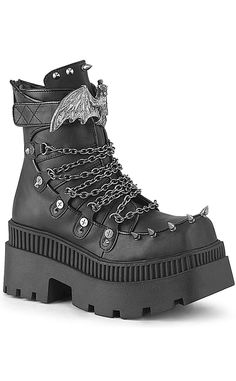 Stay Spooky™ with the WRATH-55 Platform Boots! These babies make a statement with the chains covering the front of the shoe and decked out with a metal bat top strap. 3 1/4" Inch (83mm) Chunky Heel 2" Inch (51mm) Square-Toe Platform Ankle Boot Featuring Ornamental Lacing Chain Detail, All Over Screw & Metal Spike Studs & Hook-N-Loop Large Metal Bat Top Strap Metal Spike Studs Hanging Double Chain & Charm Details Back Side Metal Zip Closure 100% Vegan. US women's sizing: refer to size chart for more info. Bat Top, Good Dye Young, Thigh High Sock, Gothic Culture, Leather Platform Boots, Metal Bat, Goth Boots, Demonia Shoes, Metal Spikes