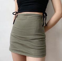 This skirt has a casual and a street style appearance. Available in three colours. SIZE CHART Waist Length Small 62 cm 35 cm Medium 66 cm 36 cm Large 70 cm 37 cm Cheap Fitted Mid-rise Cargo Skirt, Casual Solid Color Cargo Mini Skirt, Casual Green Mini Cargo Skirt, Green Mini Cargo Skirt With Side Pockets, Green Mini Cargo Skirt In Cotton, Uniqlo Skirt, Winter Activewear, Lapel Pins Mens, Vintage Streetwear