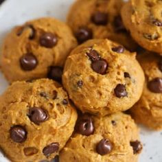 a plate full of chocolate chip cookies on a table