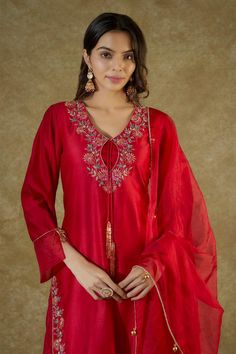 Red straight kurta, highlighted with floral hand embroidery using zardozi and glass beads. Paired with a palazzo and dupatta with gold latkans. - Aza Fashions Anarkali Red Sets With Floral Embroidery, Red Saree Set With Floral Embroidery, Red Floral Embroidered Sets For Navratri, Red Floral Embroidered Saree Set, Red Sets With Floral Embroidery For Navratri, Red Sharara With Floral Embroidery For Navratri, Red Semi-stitched Set With Floral Embroidery, Red Floral Embroidery Sharara For Navratri, Red Floral Embroidered Sets For Festivals