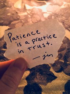 someone holding up a piece of paper that says,'presence is a practice in trust '