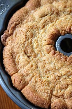 a cake in a pan with a hole in the middle that looks like it has been baked