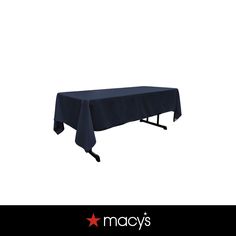 an image of a table with a black cloth on it and the words macy's above it