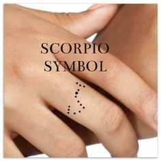 a woman's hand with a ring on it and the words piscs symbol