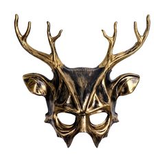 a gold mask with antlers on it's face is shown against a white background