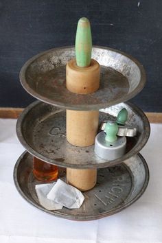 three tiered trays with different items on them