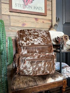 This backpack is HUGE!! it’s perfect for a diaper bag or your airport travel bag! It has a ton of room and so many pockets making this the perfect useful bag for traveling or making sure you have everything for your kiddos! Backpack measures approximately 10” x 16” x 16” Genuine cowhide 2 front pockets, side pocket on each side both inside and outside. Card slots & zipper pocket on the inside as well! LAST PICTURE IS FOR SIZE REFERENCE ON We show the EXACT hide here so you know what you’re getti Brown Backpack For Weekend Trips, Large Rectangular Backpack For Weekend Trips, Travel Backpack Diaper Bag, Weekender Backpack With Luggage Sleeve, Rectangular Large Capacity Backpack For Weekend Trips, Travel Backpack Diaper Bag With Removable Pouch, Large Capacity Rectangular Backpack For Weekend Trips, Travel Diaper Bag Backpack With Removable Pouch, Travel Bag With Removable Pouch