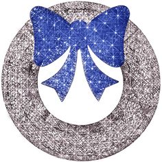 a blue bow sitting on top of a white circle with snowflakes in the background