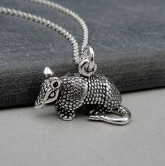 "This Armadillo Necklace comes on a sterling silver chain that is available in different lengths. Please choose your desired length from the drop-down menu when placing the item in your shopping cart.  { CHARM DETAILS } ★ Material: 925 Sterling Silver ★ Finish Color: Silver ★ Measurements: 1/2\" x 5/8\" ★ Dimensions: 3-Dimensional ★ Made in the USA { SIMILAR ITEMS }  More Texas themed items available from my shop: https://www.etsy.com/shop/treasuredcharms/search?search_query=texas { GIFT OPTIONS} Gift boxes are available at no additional cost and can be added from the drop-down menu during checkout.   You can mark it as a gift, add a gift message, and send it directly to a recipient by entering their address in the 'shipping address' during checkout.  Receipts with price information are no Engraved Sterling Silver Jewelry With Snake Chain, Oxidized Sterling Silver Snake Chain Jewelry, Texas Necklace, Texas Gifts, Pandora Beads, Pandora Bracelet, Beaded Dangles, Sterling Silver Chain, Cable Chain