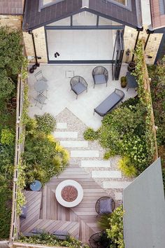 an aerial view of a patio with chairs and tables