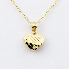 "10K Yellow Gold Pendant Heart Shaped with 2 different sides. Pendant Height: 0.56″ Pendant Width: 0.42″ * Comes in a Beautiful Gift Box , Perfect for Gifting ------------------------------------------------- Chain options: - Gold plated sterling silver chain 16\", 18\" - 10KT Yellow Gold 16\",18\", 20\" - 14KT Yellow Gold 16\",18\", 20\" Thickness is 1-1.2mm Weight is 1-2 grams ------------------------------------------------ * Please click here to visit my shop: https://www.etsy.com/shop/bestj Gold Double Heart Necklace For Birthday, Yellow Gold Heart Pendant Necklace For Birthday, Gold Heart Necklace For Birthday Gift, Gold Heart Necklace For Birthday, Diamond Cut Yellow Gold Heart Necklace Gift, Diamond Cut Double Heart Necklace For Gift, 14k Gold Diamond Cut Heart Necklace For Valentine's Day, 14k Gold Heart Necklace With Diamond Cut For Gift, Double Heart Diamond Cut Heart Necklace As Gift