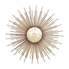 a gold and white sunburst wall decoration