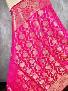 Beautiful Hot Pink Color Dupatta with Floral Jaal design Perfect Gift !! Very Light Weight Item: DupattaBase color : Hot PinkFabric : Semi Silk (Not Pure Silk)Work : Zari Weaved with tasselsLength of the Dupatta : 96 inches approx.Width of the dupatta : 38 inches (Approx.)Store Policies- No return or exchange will be accepted for color variations.- No return or exchange will be accepted if the color does not match your other clothing or your partners or anyone else.- Since this Dupatta is handma Dupatta For Lehenga, Jaal Design, Indian Dupatta, Stole Scarf, Readymade Blouse, Scarf Gift, Pink Fabric, Pure Silk, Base Colour