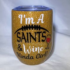 i'm a saints and wine kinda girl glitter tumbler cup with football design