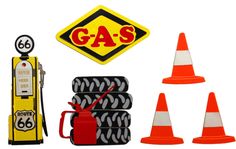 various types of gas pumps and traffic cones