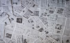 many newspapers spread out on top of each other in the middle of an image with black and white images