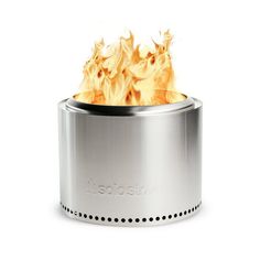 a stove that has some kind of fire in it's burner on the side