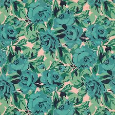 a blue flowered fabric with green leaves on it