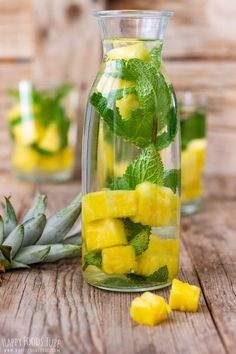 pineapple and mint water in a glass pitcher