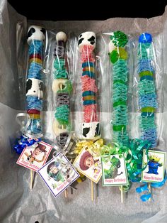 an assortment of lollipops wrapped in plastic