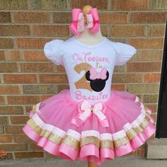 This a beautiful Minnie MouseThemed Tutu Set. This set includes top, tutu and headband/bow. If there are any small details you would like added or removed, please contact me prior to ordering. Comes with bodysuit or shirt, headband or bow and ribbon trimmed tutu . I have a few sizes in stock of long sleeves. Please message me and I can confirm. 0/3 - 12/18 come with a headband and all other sizes come with a bow. If you would like something different please leave me a note when checking out. Whe Minnie Mouse Dress Toddler, Pink Minnie Mouse Dress, Minnie Mouse Tutu Outfit, Tutu Minnie, Minnie Mouse Birthday Outfit, Kylie Birthday, Minnie Mouse Tutu, Ribbon Tutu, Ribbon Trim Tutu