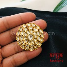 Tyaani Inspired Pacchi Kundan Golden Adjustable Ring Features: Adjustable Ring to match any finger size 22 Karat Gold Finish Lightweight Jewelry Made in Brass with very high quality Kundan stones Suitable for any occasion and traditional or Modern attire Ready to ship and available for local pickup from 23059. Please message us for more details Free shipping on orders above $75 within USA. Round Tilla Rings For Wedding, Traditional Adjustable Rings For Festive Occasions, Traditional Ceremonial Ring Jewelry, Kundan Rings For Festivals And Gifts, Gold Ring With Stone Work, Tilla Rings For Wedding And Festivals, Traditional Festive Jewelry Ring, Flower Toe Ring With Stone Setting As Gift, Traditional Kundan Rings With Hand Set