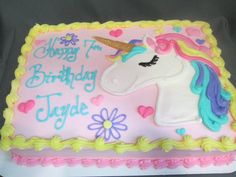 a birthday cake with a unicorn on it