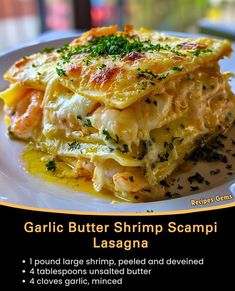 garlic butter shrimp scampi lasagna on a white plate