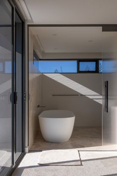 a bathtub sitting in the middle of a bathroom