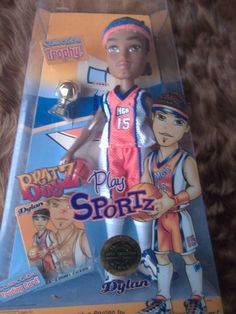 a toy basketball player is in the package for play with spriz action figure