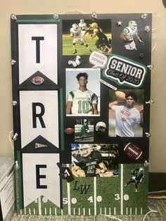 a collage of sports related items is displayed on the wall in this office cubicle