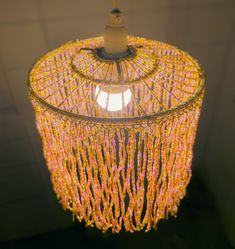 a chandelier hanging from the ceiling in a room