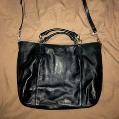 Like New! Black Leather Shoulder Bag With Silver Hardware. Adjustable And Removable Shoulder Strap. 2 Handles For Use As A Day Purse. Satin Interior. Only “Defect” Is A Few Teeny Tiny Scuffs That Are Unnoticeable (See Pics) Black Leather Shoulder Bag, Coach Purse, Coach Purses, Silver Hardware, Leather Purses, Coach Bags, New Black, Leather Shoulder Bag, Shoulder Strap