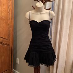 This Is A Black Mini Dress From Forever 21 That Comes With A Diamant Bow Belt. This Dress Is A Size Small And It Runs Very Very Small. I Am 90lbs And I Could Not Get The Zipper Past My Hips. This Dress Is Also Very Short It Reaches My Knees Exactly And I Am 5ft. That Being Said, The Cut Of This Dress Is Adorable And The Belt Is Not Attached And Can Be Used On Other Pieces. The Dress’ Cups Are Padded And It Has That Lining On Top To Help Keep It Up. Nwt. Black Corset Dress Short, Belt Over Dress, Corset Dress Short, Worst Witch, Black Corset Dress, Bow Belt, Black Mini Dress, Black Corset, Corset Dress