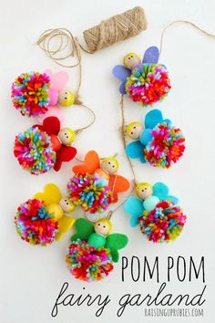 several small toy pom poms are arranged in the shape of angels and flowers