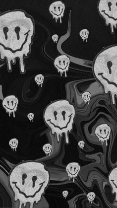 black and white artwork with lots of skulls on the bottom, in front of an abstract background