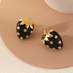 ✦ Add a touch of sweetness to your style with our adorable Cute Strawberry Stud Earrings. These delightful Fruit Earrings showcase miniature strawberries, capturing the essence of nature's charm. Crafted with attention to detail, they are the perfect accessory for those who appreciate playful and cute jewelry. Surprise her with these charming Black Jewelry pieces, a delightful gift that will bring joy and a pop of cuteness to her day.----------- DESCRIPTIONS ----------- *Sold in Pairs- SKU: DMS2 Cute Fruit Design Earrings, Strawberry Jewelry, Black Strawberry, Surprise Her, Fruit Earrings, Cute Strawberry, Black Jewelry, Cute Jewelry, Girl Gifts