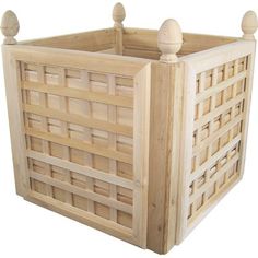 a large wooden box with two posts on each side