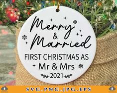 merry and married first christmas as mr & mrs ornament hanging on a tree