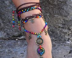 This listing is for one anklet. Beautiful macrame anklet. You can wear it alone or in combination with the barefoot sandals available in my shop (picture 2, 3 and 6) https://www.etsy.com/listing/216695617/shanti-rainbow-mandala-barefoot-sandals?ga_search_query=shanti&ref=shop_items_search_1 This anklet is made with waxed polyester cord, antique bronze beads, antique bronze spiral charms and czech seed seed beads. They close with a lobster claw and on the other side a small chain allows to ad Colorful Beads Anklet For Festival, Bohemian Toe Ring For Festivals, Adjustable Toe-ring Anklets For Festivals, Bohemian Style Toe Ring For Festivals, Bohemian Festival Toe Ring Jewelry, Bohemian Anklets For Festivals, Handmade Bohemian Bracelets For Festival, Bohemian Style Festival Toe Ring, Bohemian Multicolor Anklets With Colorful Beads