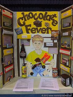 a display in the shape of a booth for chocolate fever