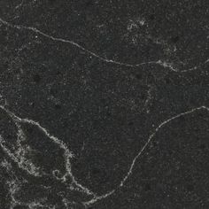 black marble with white swirls on it