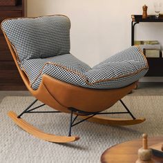 a rocking chair with checkered fabric on it