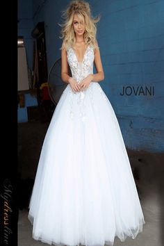 Indulge in elegance with Jovani 11092. This exquisite tulle ball gown exudes sophistication with its intricate embroidery and flattering A-line silhouette. Perfect for prom, special occasions, or a glamorous mother of the bride look. Make a statement in luxury. Sweet Sixteen Dresses, Pronovias Wedding Dress, Jovani Prom, Formal Ball Gown, Prom Dresses Jovani, Prom Dress Stores, Prom Dress Styles, Jovani Dresses, Tulle Ball Gown