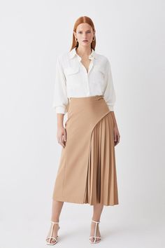 Feel Elegant In Our Midi Skirt, With A Universally Flattering Silhouette, Pleated Detailing, And A High Waistline, Perfect For Getting A Little Dressed Up. Style This Piece With Strappy Heels For An Outfit That Will Turn Heads From Office Days To Upcoming Occasions And Events. Tailored Buckle Detail Pleated Midi Skirt Formal, Flowing Fit High Waistline Unique Pleated Panel Midi Length Metallic Buckle At Waistline Blouses For Women Chic, Smart Aesthetic, Skirt Collection, Belt Skirt, Outfits Petite, Womens Business Casual, Crisp White Shirt, Skirt Style, Midi Skirts