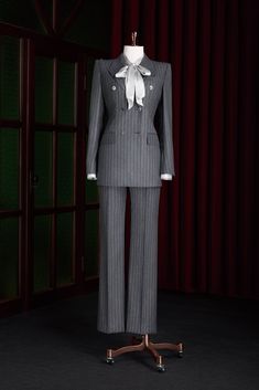 Elevate your look with this grey pinstripe suit, perfect for anyone who values impeccable tailoring and timeless style. Whether it's a business meeting or a social event, this suit promises a sophisticated and confident appearance for the modern professional. Striped Tuxedo Suit For Business, Elegant Tailored Pinstripe Three-piece Suit, Elegant Pinstripe Suit With Suit Collar, Elegant Pinstripe Tailored Three-piece Suit, Formal Pinstripe Double Breasted Suit With Notch Lapel, Pinstripe Double Breasted Suit With Notch Lapel, Elegant Striped Double-breasted Suit For Office, Elegant Striped Double Breasted Suit For Semi-formal Occasions, Elegant Pinstripe Suit For Formal Occasions