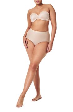 Experience full-coverage comfort when you slip into these classic high-waist briefs. Cotton-lined gusset 55% nylon, 45% Lycra® spandex Machine wash, dry flat Imported Nylon Bottoms With Smoothing Full Coverage, Compressive Full Coverage Nylon Bottoms, Supportive No-show Bottoms With Moderate Coverage, Smoothing Full Coverage Nylon Bottoms, Supportive Brief Shapewear With Moderate Coverage, Supportive Nylon Shapewear Bottoms, Beige Full Coverage Smoothing Bottoms, Beige Smoothing Full Coverage Bottoms, High Waist Shapewear Bottoms With Moderate Coverage